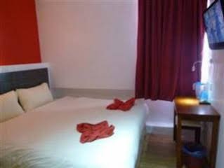 Capital O 90726 V Hotel