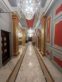 Cosmopolitan Plaza INN Hotel
