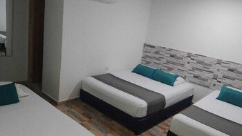 The Mendoza Grand by Ayenda Rooms