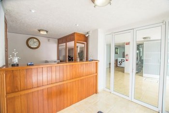 Suites Poliforum Inn