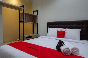 Gossip Guesthouse by Reddoorz
