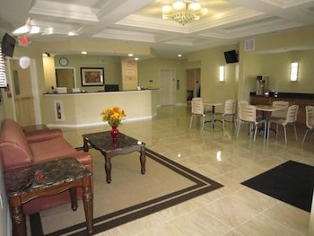 Red Carpet Inn And Suites Monm