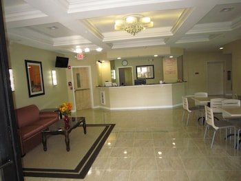 Red Carpet Inn And Suites Monm