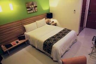 Capital O 820 Guijo Suites Makati
