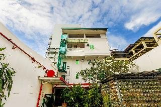 City Smiles Apartelle by OYO Rooms
