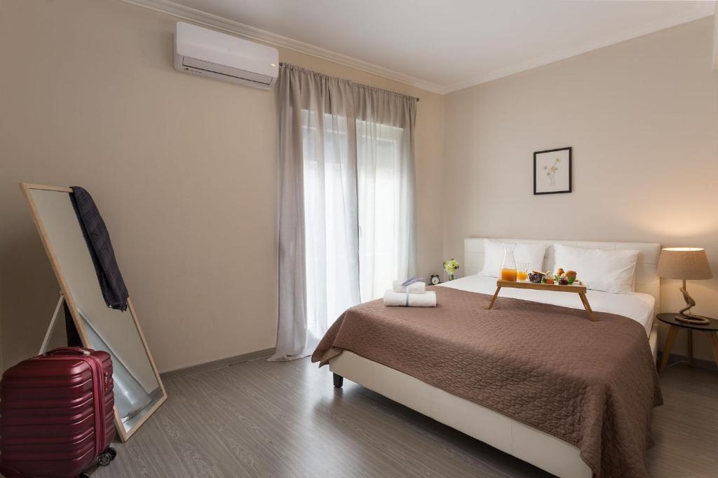 Homely Apartments by Athens Stay
